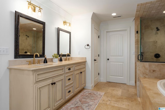 bathroom with double vanity, tile flooring, and independent shower and bath