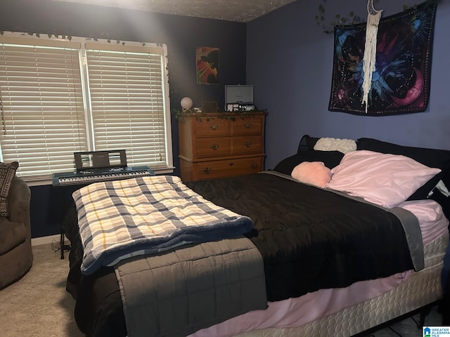 bedroom featuring carpet