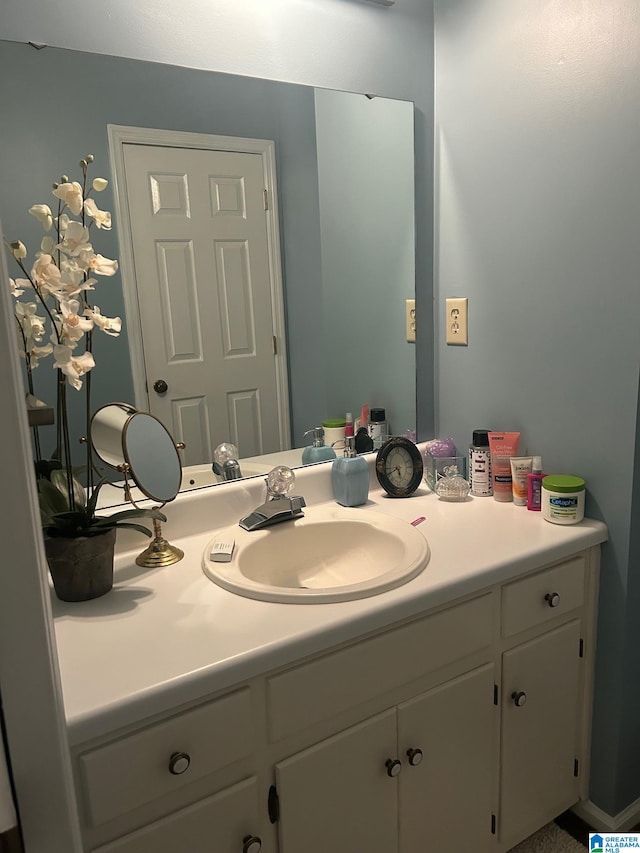 bathroom featuring large vanity