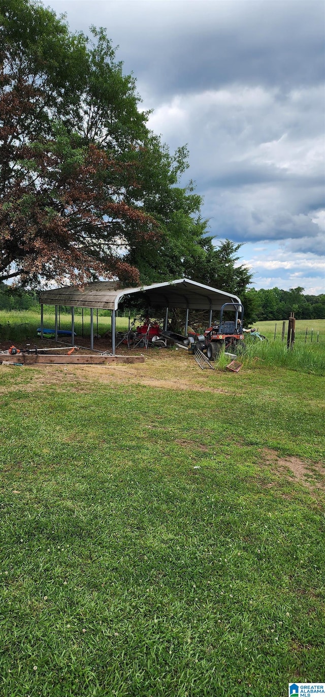 view of yard with a carport