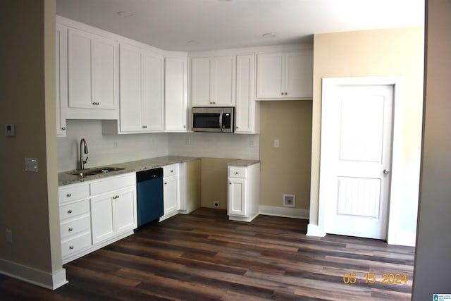 kitchen with white cabinetry, light stone countertops, dark wood-type flooring, sink, and black dishwasher