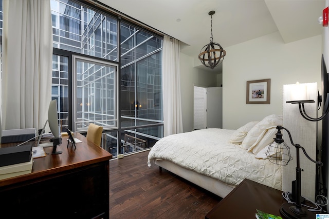 bedroom featuring dark hardwood / wood-style floors