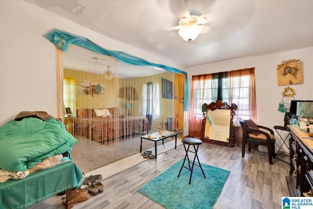 bedroom with wood-type flooring