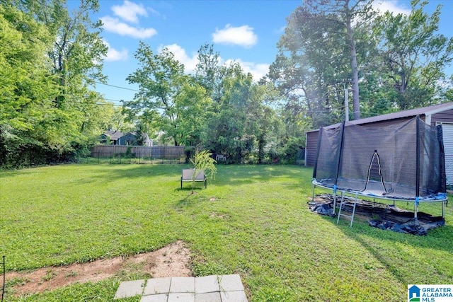 view of yard featuring a trampoline