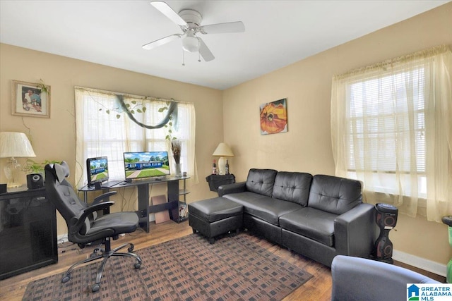 office space featuring ceiling fan and hardwood / wood-style floors