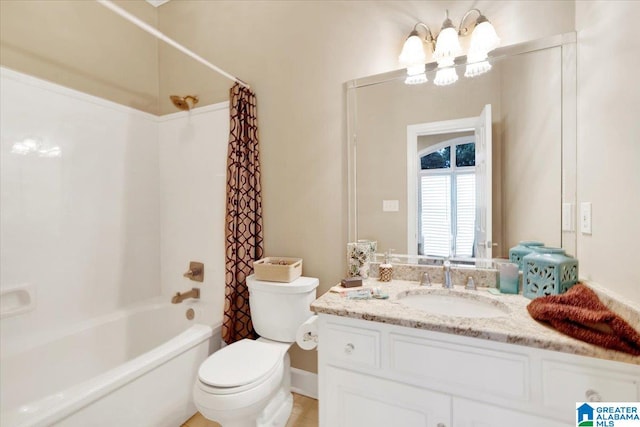 full bathroom with vanity, shower / bath combo with shower curtain, and toilet