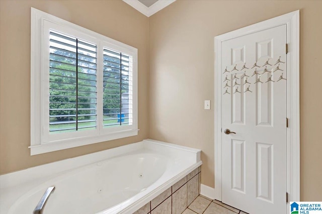 bathroom featuring tiled tub and tile patterned flooring