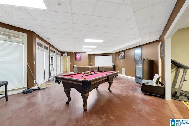 playroom with pool table, a drop ceiling, and wood-type flooring