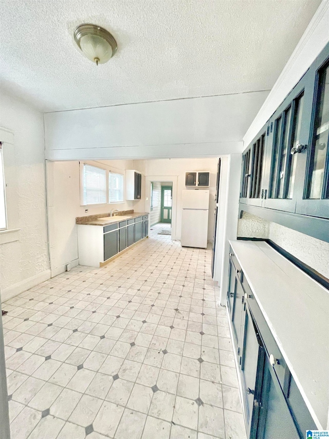 view of patio featuring sink and an outdoor kitchen