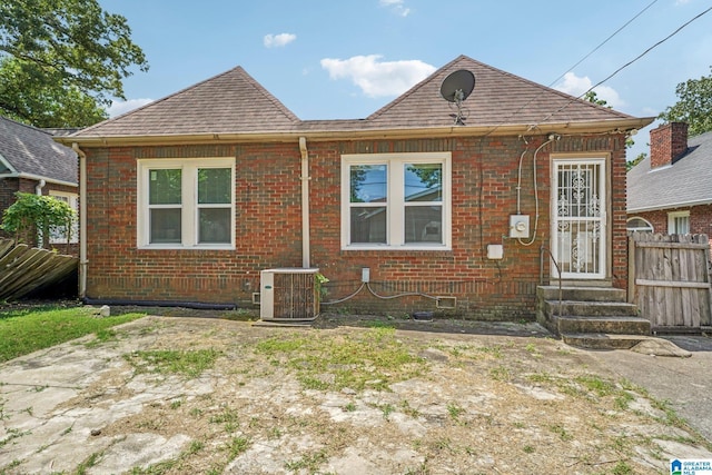 view of front of house featuring central air condition unit