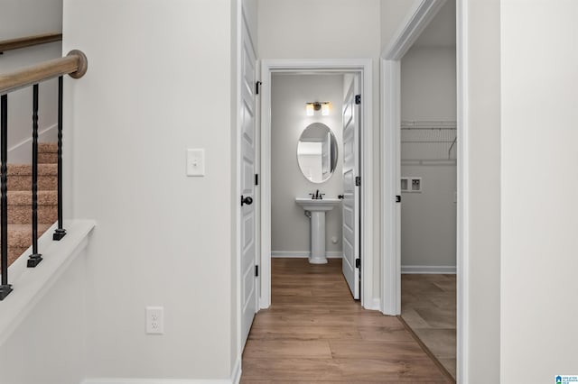 hall with light hardwood / wood-style flooring