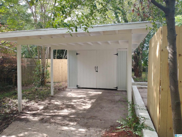 view of parking with a carport