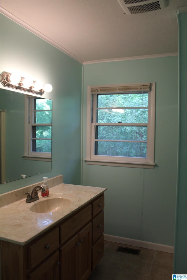 bathroom with tile floors and vanity