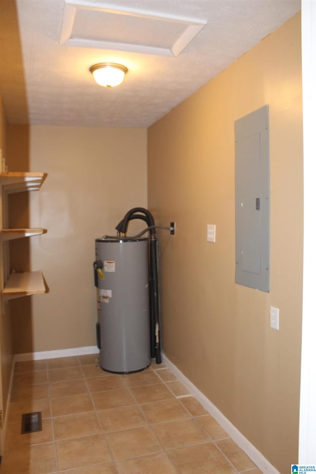 utility room featuring water heater