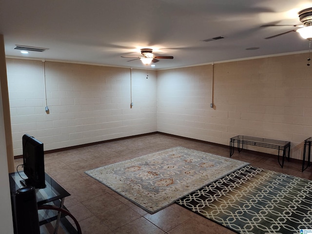 interior space featuring ornamental molding and ceiling fan