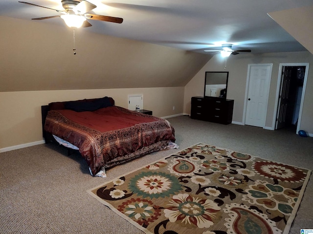 bedroom featuring carpet floors, lofted ceiling, and ceiling fan