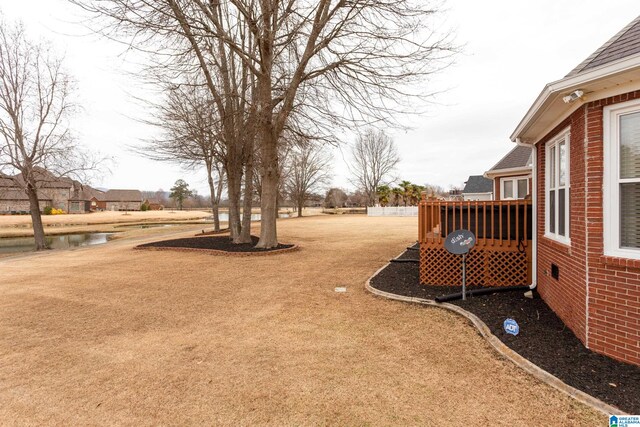 view of yard with a deck