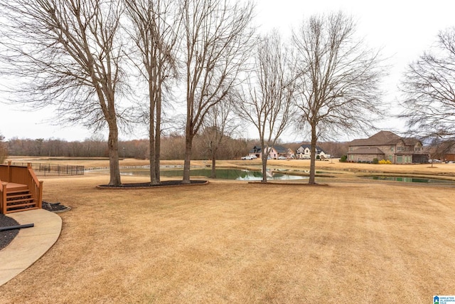 view of yard featuring a water view