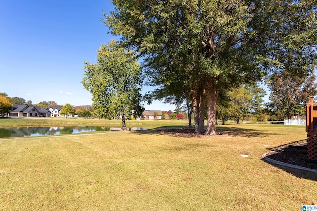 view of yard with a water view