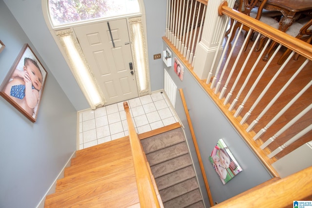 foyer entrance featuring a high ceiling