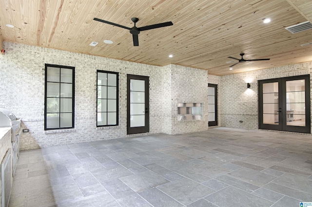 interior space with ceiling fan, area for grilling, and french doors