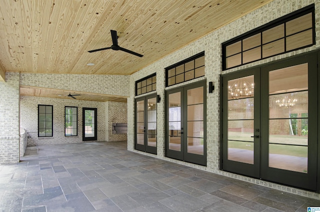 view of patio featuring ceiling fan and french doors