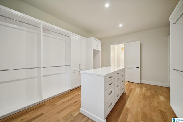 walk in closet featuring light wood-type flooring