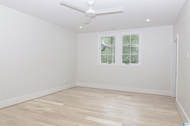 unfurnished room with light hardwood / wood-style flooring and ceiling fan