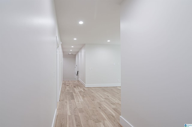 corridor featuring light hardwood / wood-style flooring