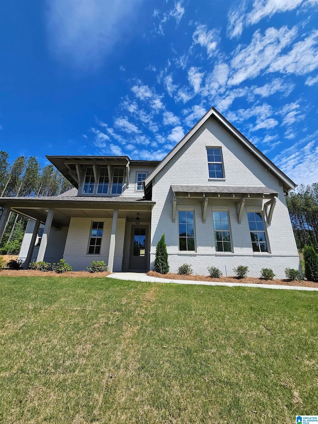 view of front of home with a front yard