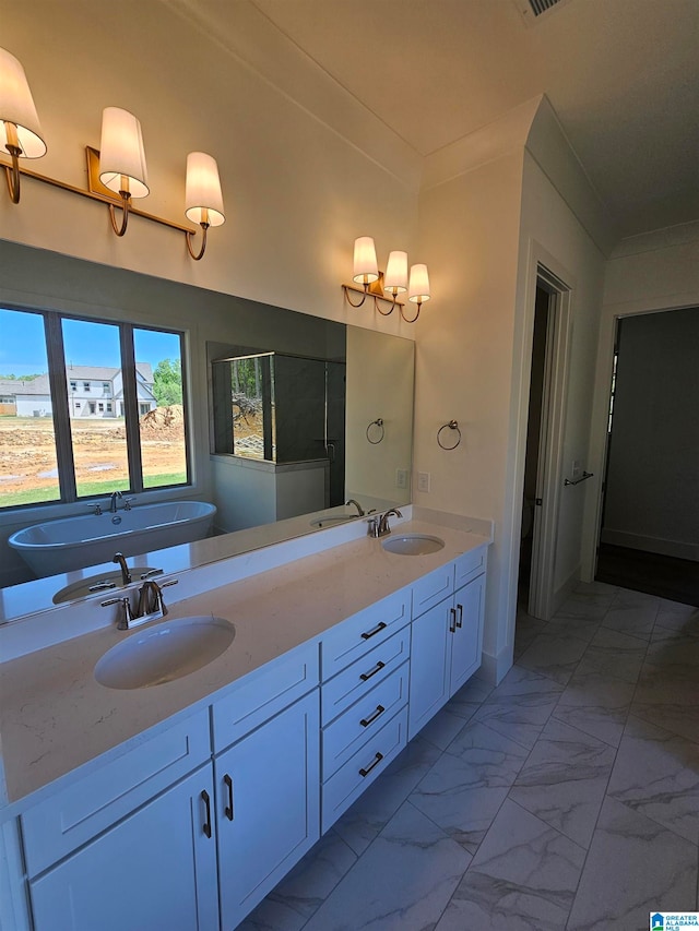 bathroom with dual vanity, a washtub, tile flooring, and crown molding