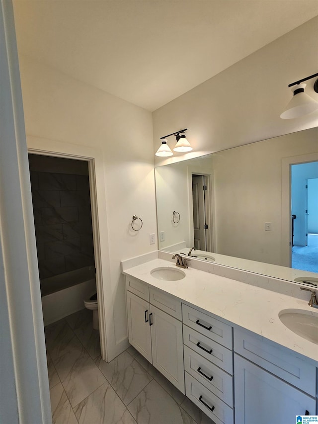 bathroom featuring double sink vanity, toilet, and tile floors
