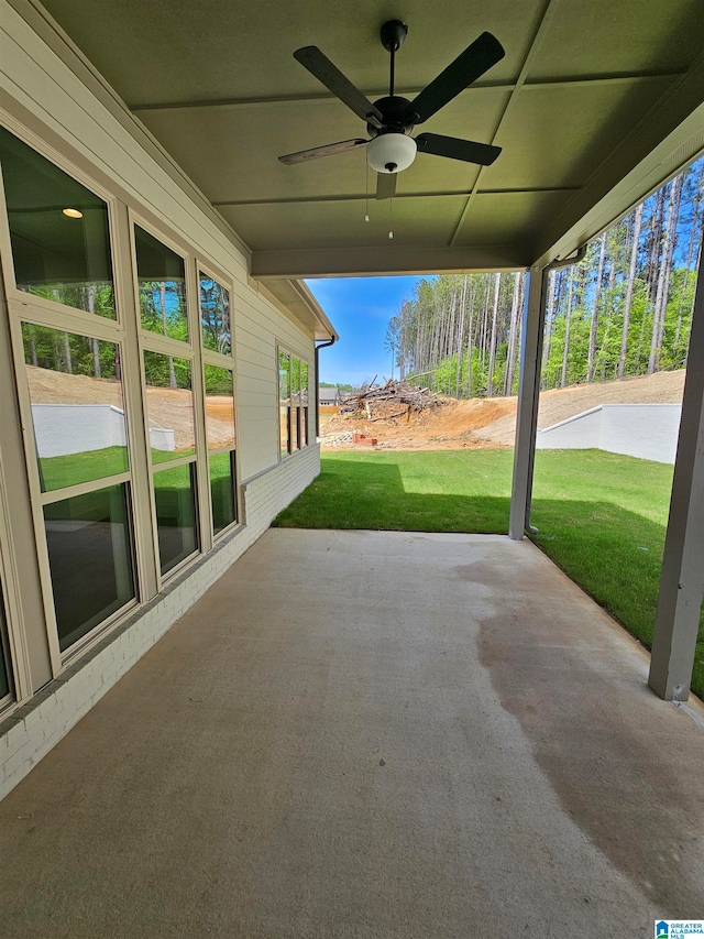 view of patio featuring ceiling fan