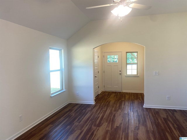 entrance foyer with dark wood-type flooring, ceiling fan, and lofted ceiling