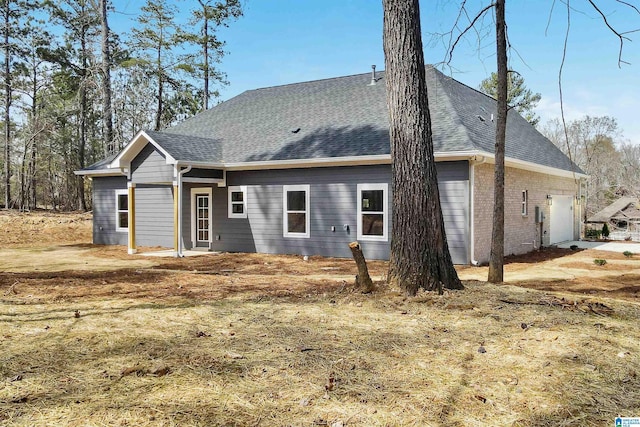 8611 Shady Trl, Helena, AL 35022 - rear view of property featuring roof with shingles and brick siding