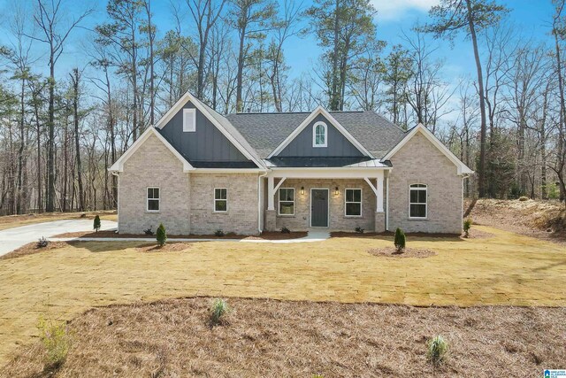 8611 Shady Trl, Helena, AL 35022 - craftsman house with board and batten siding, brick siding, and a front lawn