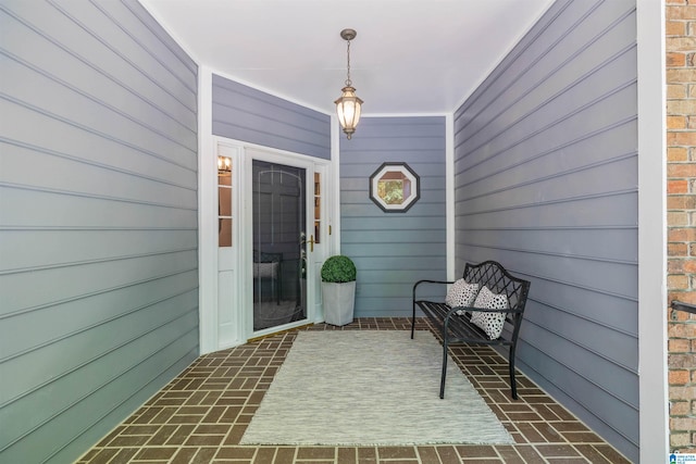 doorway to property with a porch