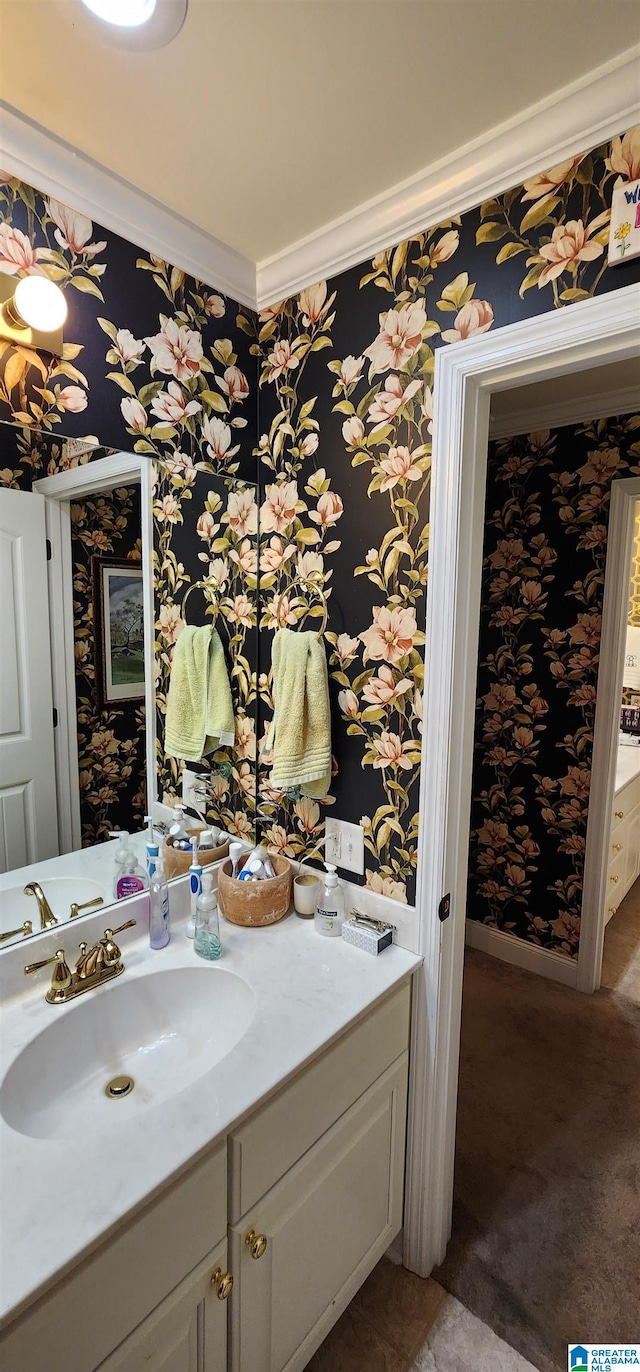 bathroom featuring oversized vanity and ornamental molding