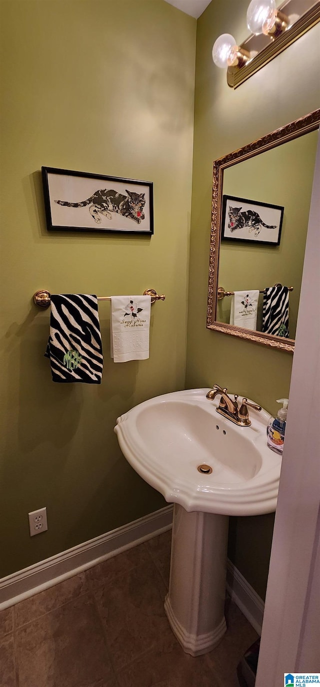 bathroom featuring tile floors