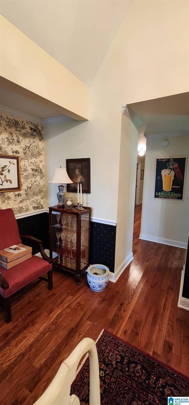 interior space with hardwood / wood-style flooring and lofted ceiling