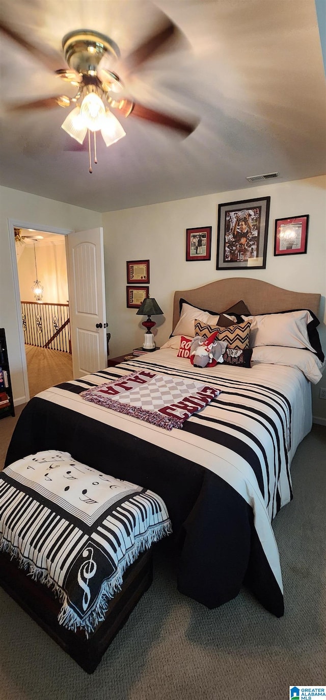 carpeted bedroom featuring ceiling fan