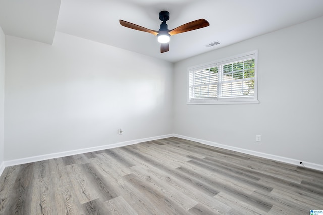 unfurnished room featuring ceiling fan and light hardwood / wood-style flooring