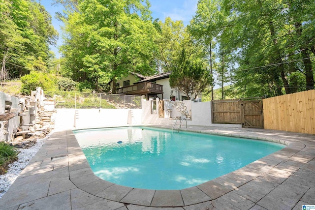 view of pool featuring a patio area