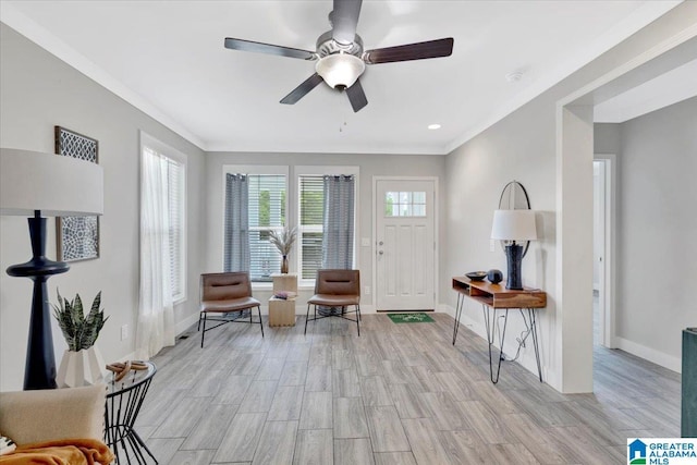 living area with ceiling fan and light wood-type flooring