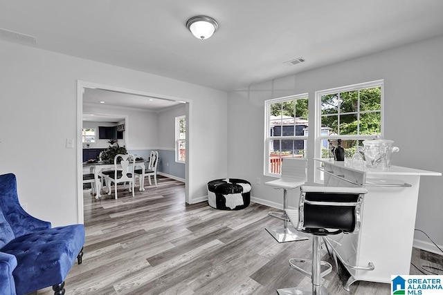 office area with light hardwood / wood-style floors