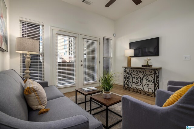 bedroom with dark hardwood / wood-style flooring, ceiling fan, and lofted ceiling