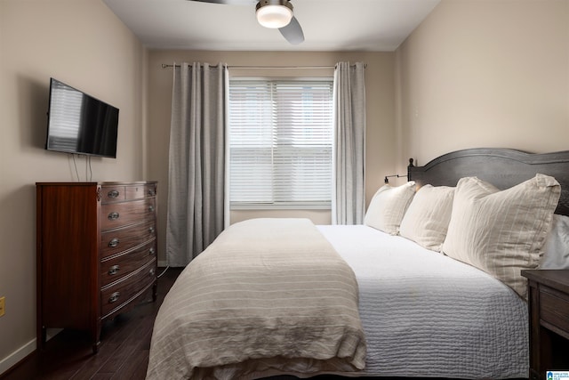 bedroom featuring dark wood-type flooring and ceiling fan