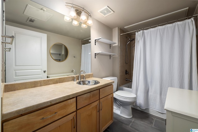 full bathroom featuring tile floors, shower / tub combo with curtain, toilet, and vanity