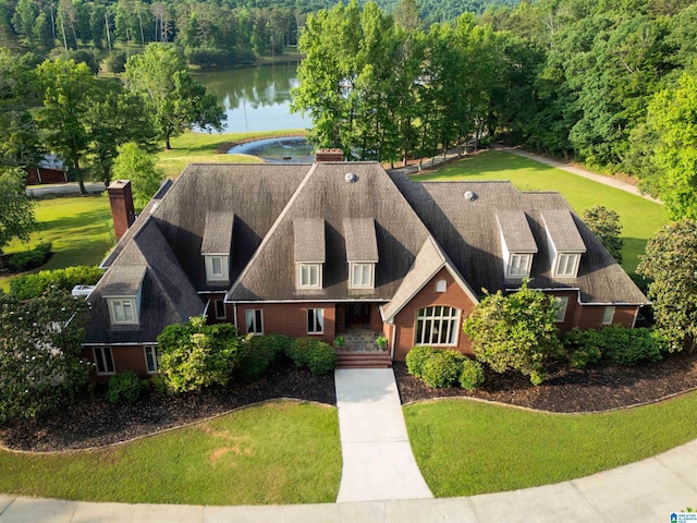 birds eye view of property featuring a water view