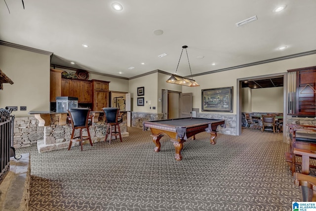 recreation room with pool table, ornamental molding, and carpet flooring